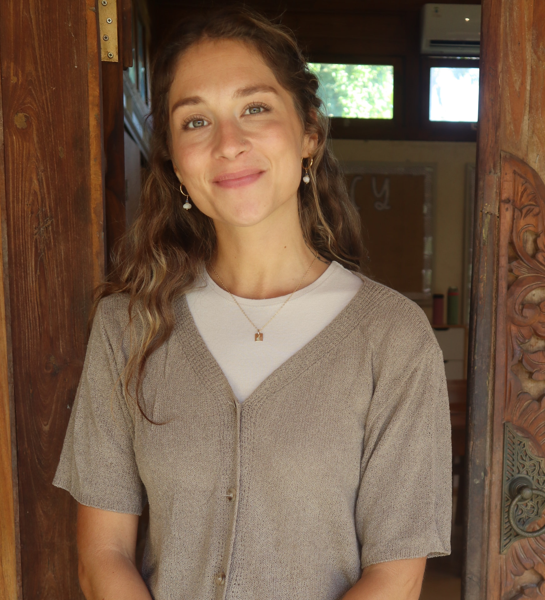 Emma Petree standing in a doorway